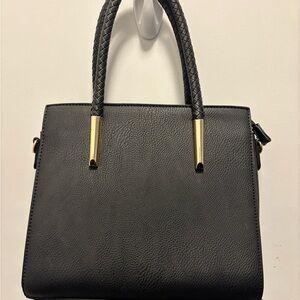 Elegant Black Handbag with Gold Accents